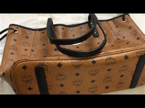 how to spot a fake mimco bag|how to spot a real mcm bag.